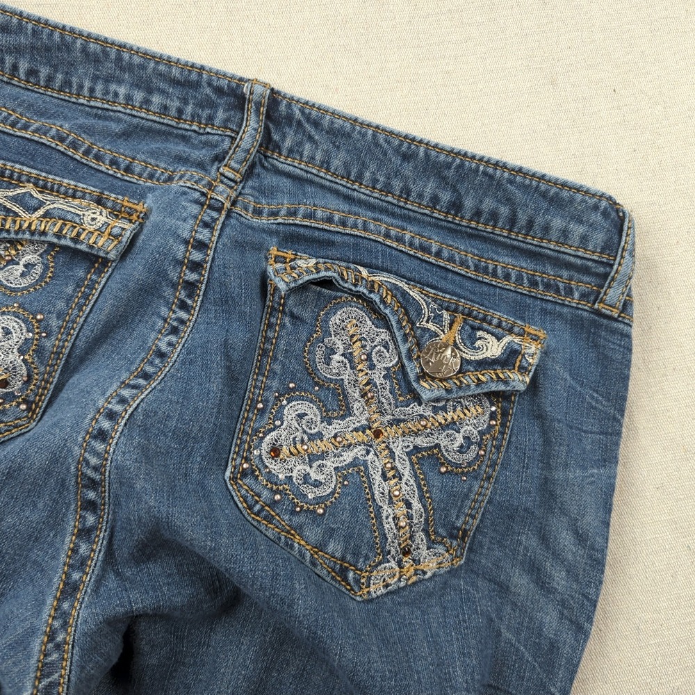 Wrangler Blue Denim Boot Cut Jeans with Embroidered Cross Pockets
